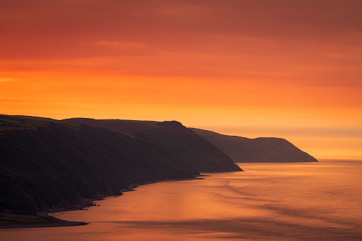 Beautiful October evening sunset from Bossington Hill Exmoor with a view over Porlock Bay, Somerset south west England