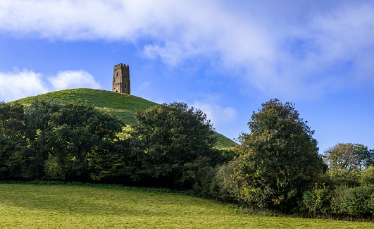 View of Glastonbury Tor from ascending Chalice Hill in Somerset south west England