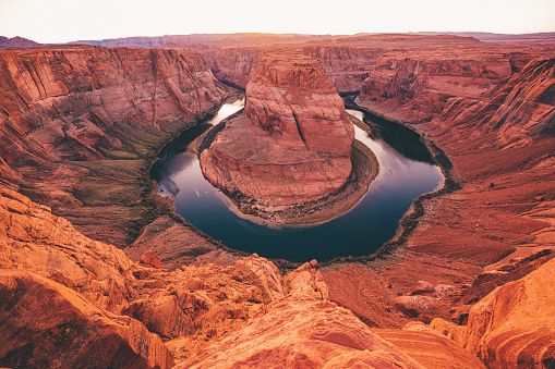 The Colorado river shaped as a horseshoe at the Horseshoe Bend. Location inside the Grand Canyon at the city of Page, Utah, United States.