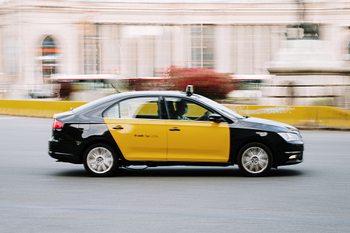 Ukraine, Kyiv - 2 June 2021: Yellow Audi Q2 car moving on the street. Editorial