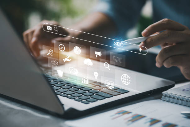 istock business person working with digital device for manage search engine optimization : SEO with social media content data and internet advertisement from website 1405961087