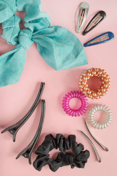 Hairties and barrettes on pink stock photo