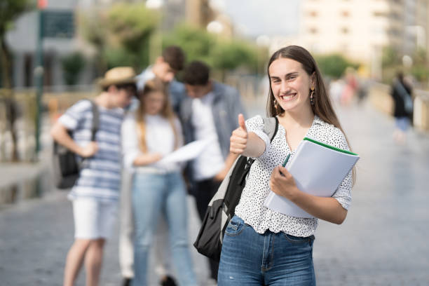 istock Portrait of beautiful student making ok sign 1405962238