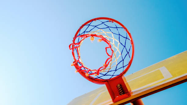istock Basketball hoop. Bottom view. Blue, yellow, red. Copy space 1405964474