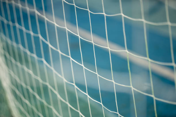 Close-up of white soccer goal net