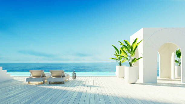 hotel e resort di lusso con vista sul mare sulla spiaggia - stile santorini - rendering 3d - vacations tourism travel white sand foto e immagini stock