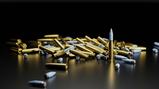 Rifle bullets over a black background, 3d rendering