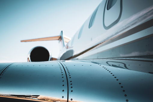 Detail of a corporate jet fuselage and engine
