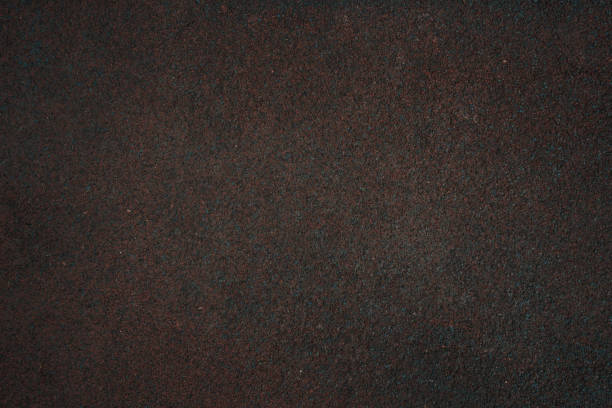 istock The texture of the road surface is black and green. 1405979196