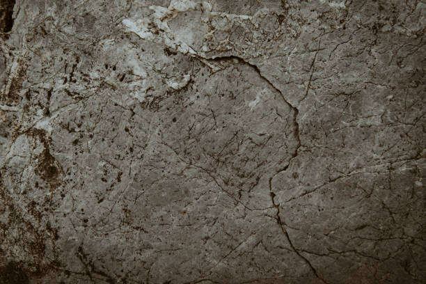 istock Top view of dark stone or rock texture background. high resolution wall design texture 1405979330
