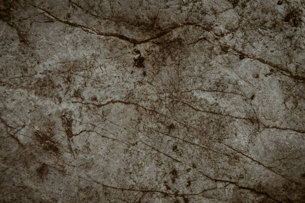 istock Top view of dark stone or rock texture background. high resolution wall design texture 1405979333