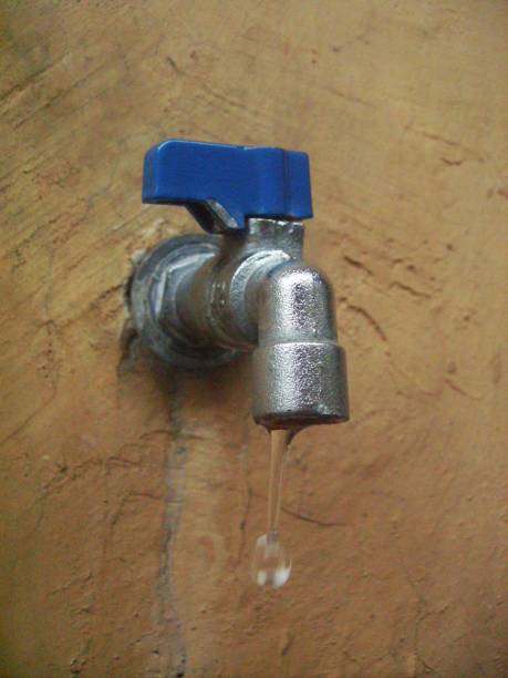 istock a house faucet dripping water 1405982014