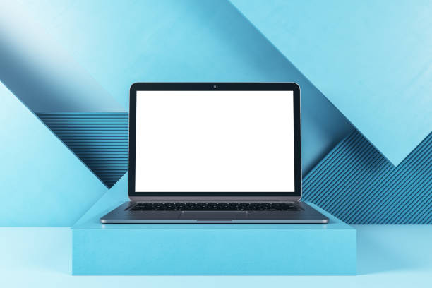 istock Close up of empty white laptop display on geometric wall background. Tech presentation and device concept. Mock up, 3D Rendering. 1405982363