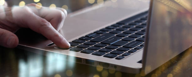 istock finger on laptop business background 1405983769