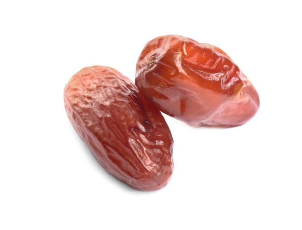 istock Tasty sweet dried dates on white background 1405986229
