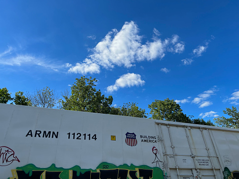 King of Prussia, USA - June 28, 2022. Union Pacific freight train at Valley Forge Train Station, Valley Forge Naional Historic Park, Pennsylvania, USA