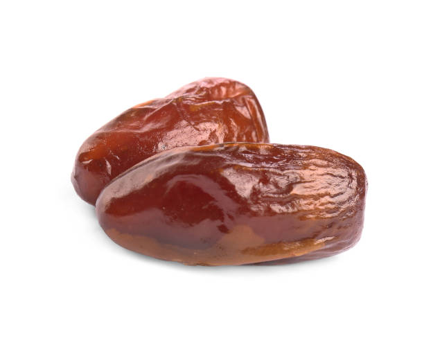 istock Tasty sweet dried dates on white background 1405986401