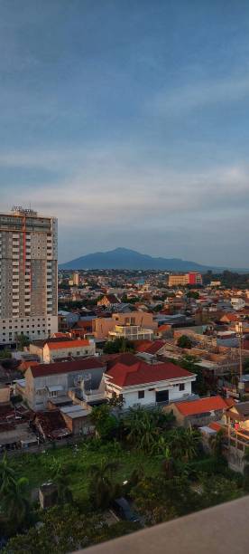 istock Houses and buildings with a mountain background 1405991269