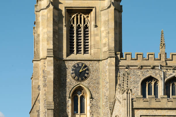 istock Gothic cathedral clock of cathedral at Saffron Walden, England 1405994890