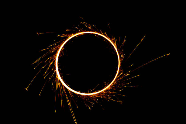Numbers 0 to 9 created using a sparkler isolated on black background