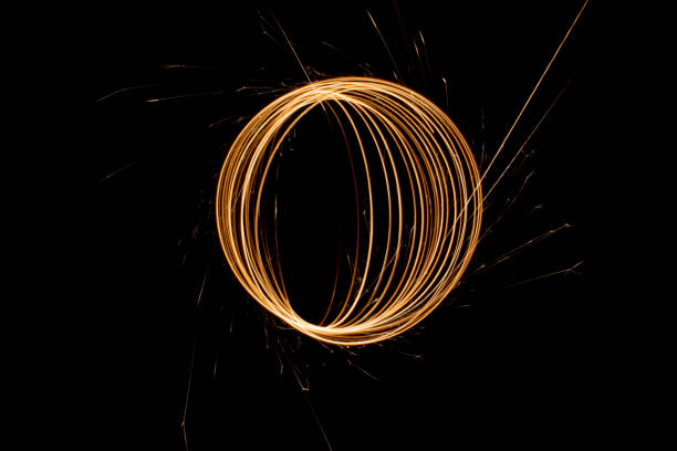 istock Circular lights with sparks on a black background 1405995306