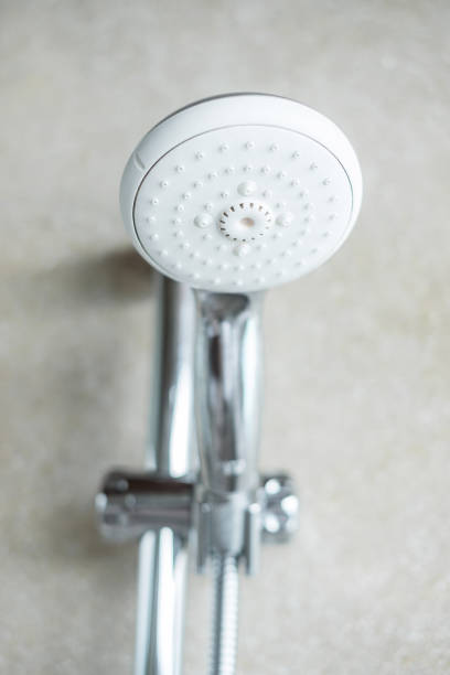 istock shower head with wall background in modern bathroom 1405998930