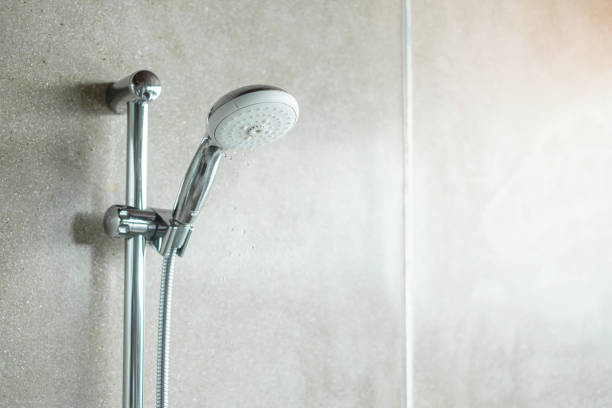 istock shower head with wall background in modern bathroom 1405999092