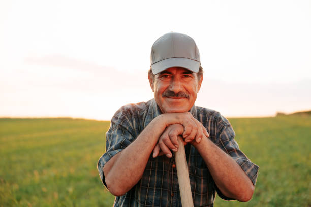 istock Old farmer with mustache handsome man looking at camera 1405999227