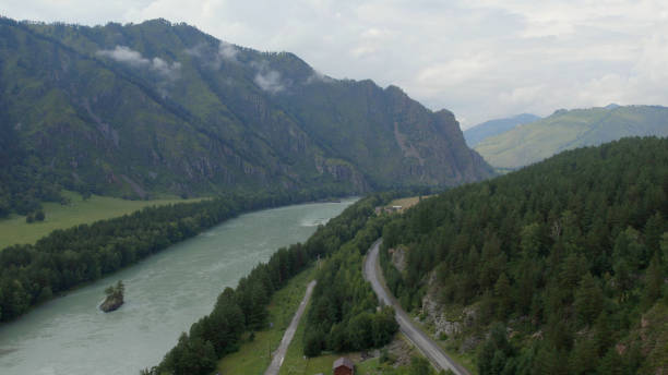 istock Katun river and road in mountains at during daytime 1406008404
