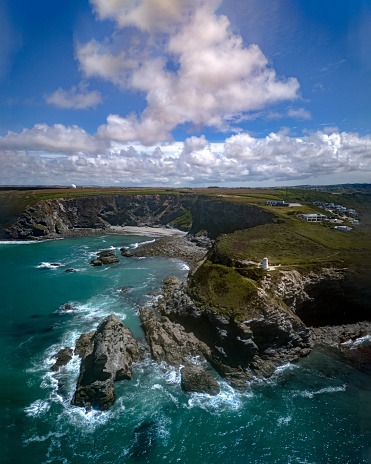 A coastal landscape showing the town of Suances in Cantabria, Spain.