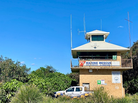 Horizontal outside of public community marine rescue beach lookout tower building at sand dune entrance to beach at Brunswick Heads near Byron Bay NSW Australia