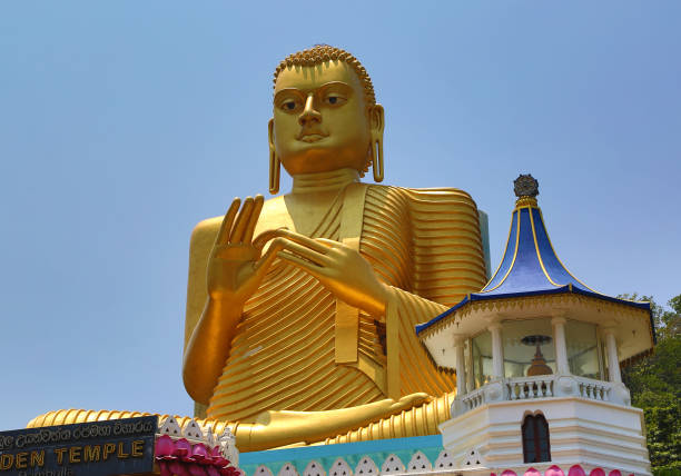 Buddha on Dambula golden temple in Sri lanka - great buddhistic landmark\