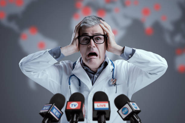 istock Terrified medical scientist interviewed by the media 1406020343