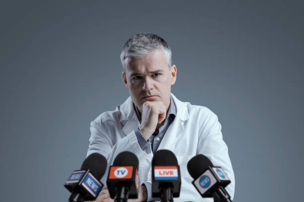 istock Medical scientist interviewed by the media 1406020476