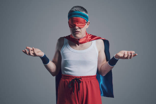 istock Funny superhero wearing a sleep mask 1406020727