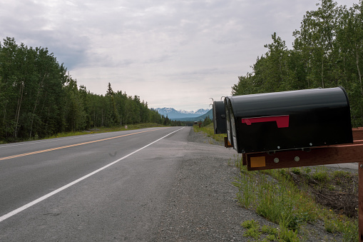 Road and mountain range ， Alaska USA