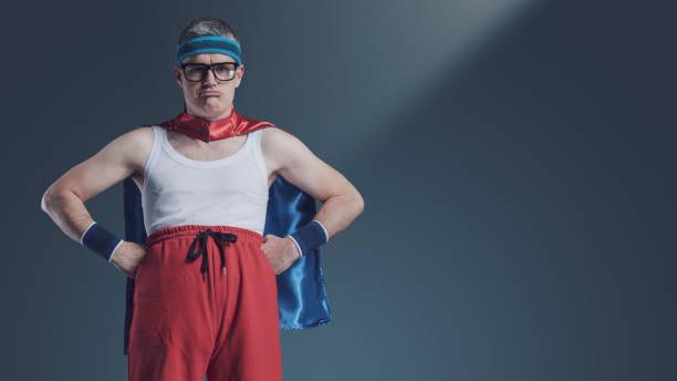 istock Funny superhero posing with arms akimbo 1406021132