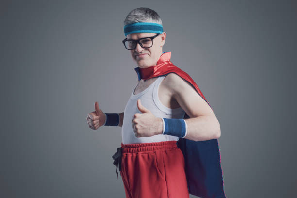 istock Funny superhero posing and giving a thumbs up 1406021246