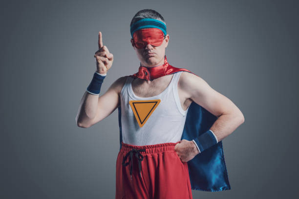 istock Funny superhero wearing a sleep mask 1406021274