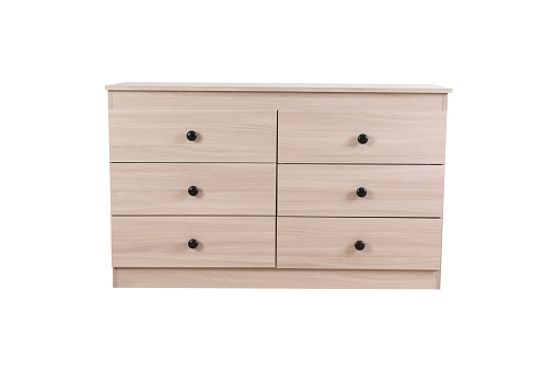 New light closed chest of drawers isolated on white background