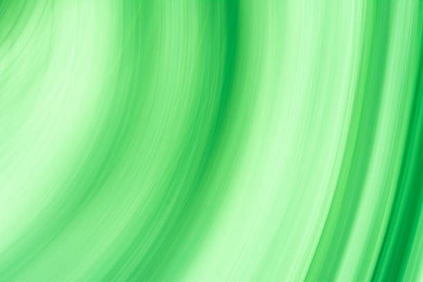 istock Background abstraction, waves and thin arcs on in a green tone. 1406027893