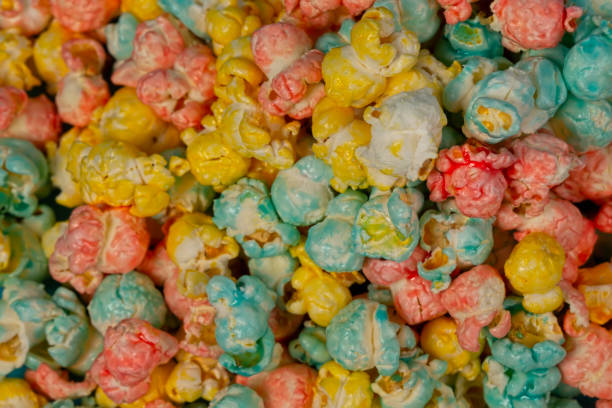 istock Multicolored popcorn close-up. Colorful beautiful sweet dessert. 1406028378