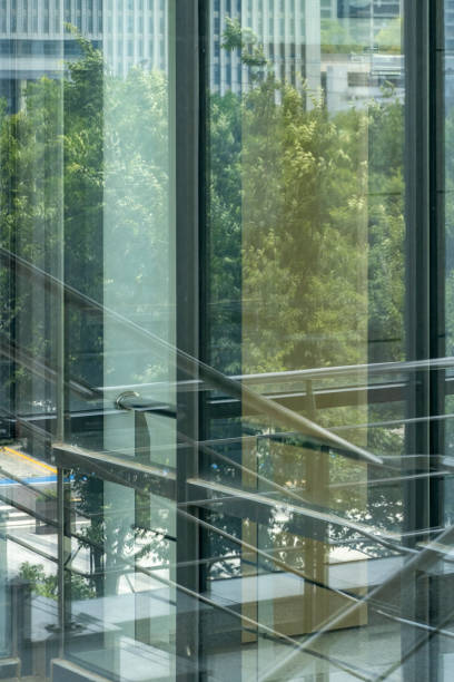 istock Building reflected in glass curtain wall 1406028457