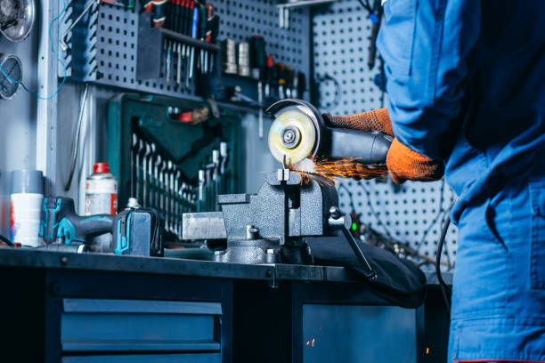istock Sawing with a grinder washer of wheel alignment Car service 1406029876