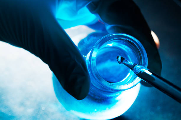 istock blue glass tube science experiment,Vacutainer or test tube in lab on table 1406034805