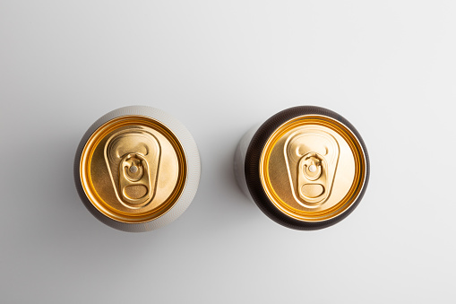 beer cans with gilded tops