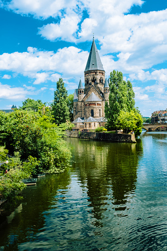 Views of the city of Metz, France. This is the Moselle river with the Temple Neuf.