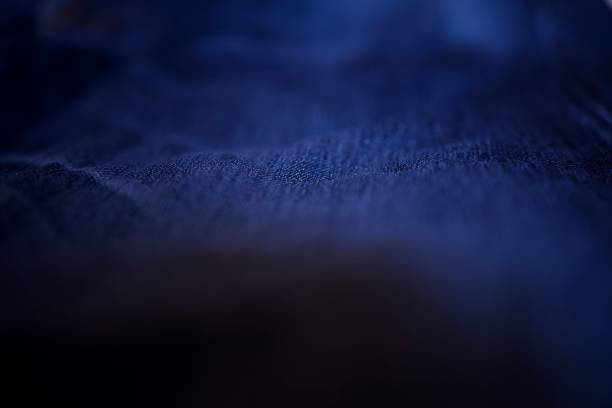 Texture of very thick old Japanese jeans trousers.