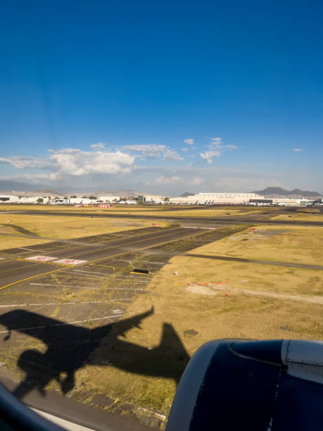 istock Airplane landing at Mexico City 1406039560