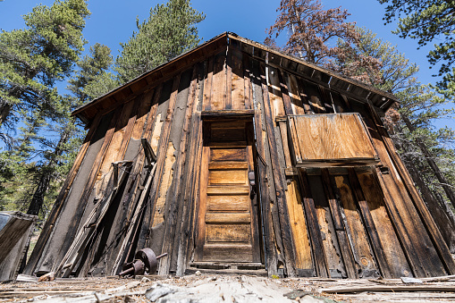 View of abandoned mining cabin on National Forest land near Mammoth Lakes in the California Sierra Nevada Mountains.